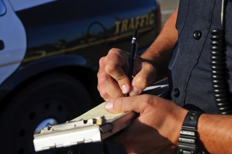 cop writing ticket
