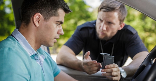 police stops driver for a breathalyzer test