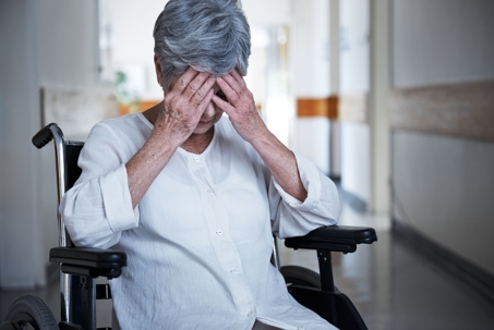 unhappy senior women in nursing home